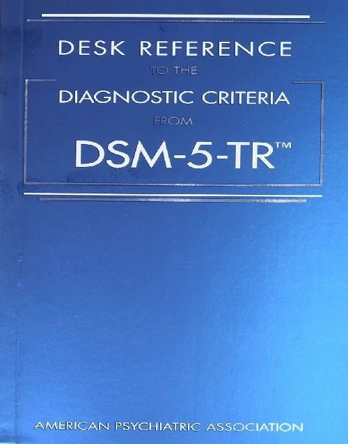 Blue cover of DSM-5-TR desk reference book showing diagnostic criteria by American Psychiatric Association